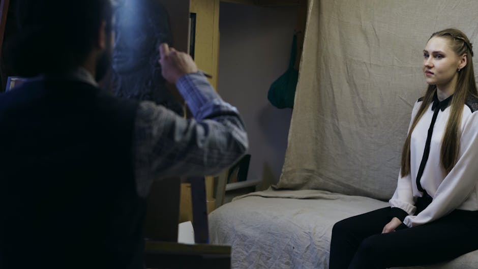 Artist captures a woman portrait in a cozy art studio setting.