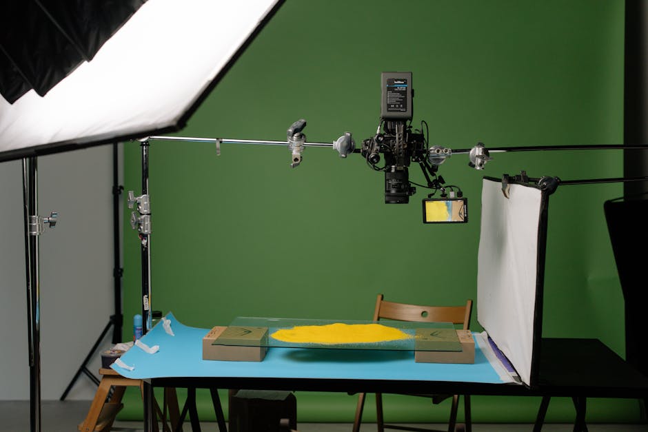 A detailed view of a professional photography studio setup, capturing products with precise lighting.